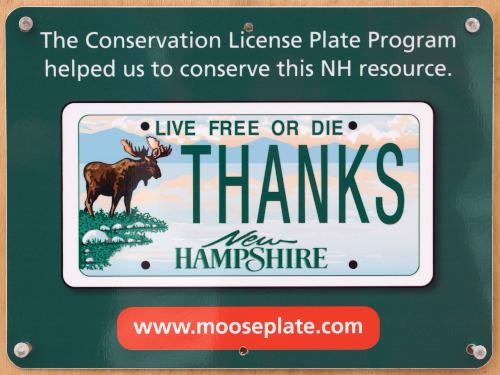 Moose Plate advertisement at Powder Major Forest near Durham in southeastern New Hampshire