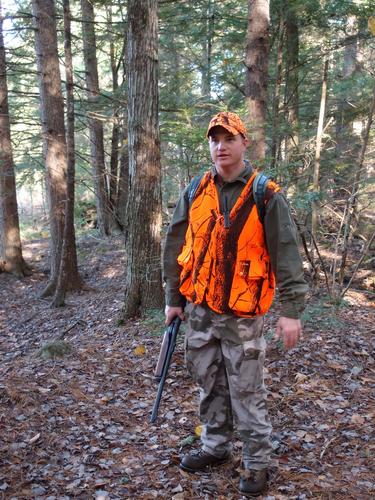 deer hunter in Purgatory Falls Brook Preserve in New Hampshire