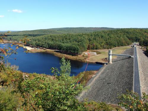 view over Everett Lake and its flood-control dam from a ledge viewpoint on Raymond Cliff in southern New Hampshire