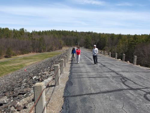 hikers on Dam Road at Clough State Park in southern New Hampshire