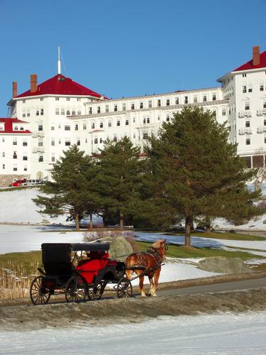 Mount Washington Hotel and horse-drawn carriage in January in New Hampshire