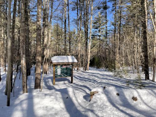 entrance kiosk and trail start in February at Red Hill River Conservation Area near Sandwich in central New Hampshire