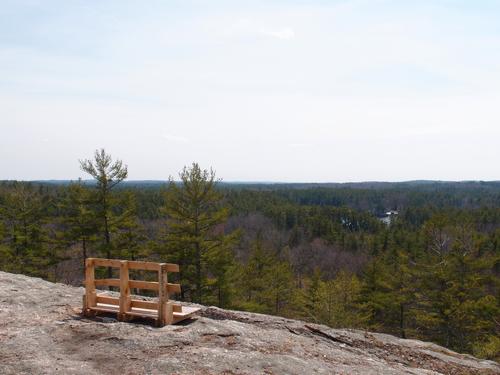viewing bench atop Rock Rimmon Hill in southeastern New Hampshire