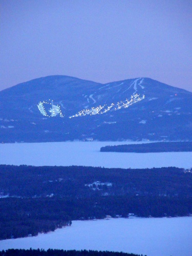 night skiing at Gunstock in March as seen from Mount Roberts in New Hampshire