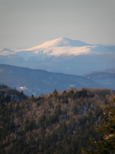 view of Mount Washington in March as seen from Mount Roberts in New Hampshire