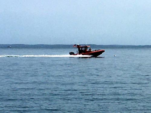 speedboat in September at Rockland Breakwater in Maine