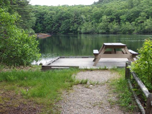 picnic table beside Chickering Pond at Rocky Woods in eastern Massachusetts