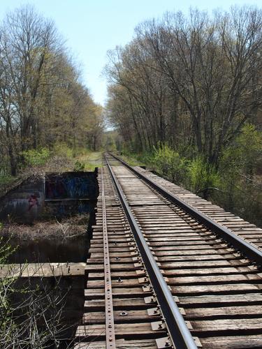 railroad track crossing the Charles River at Rocky Narrows Reservation in eastern Massachusetts