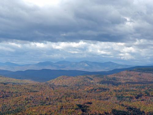 view in October towards the White Mountains of NH from Round Mountain in western Maine