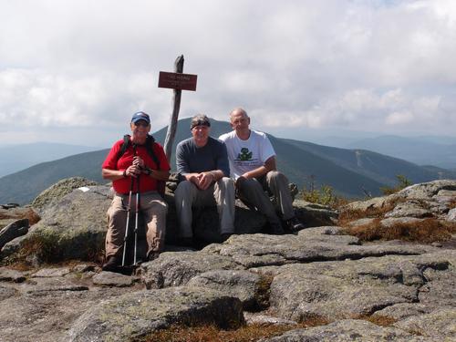 hikers on the summit of Saddleback Mountain in Maine