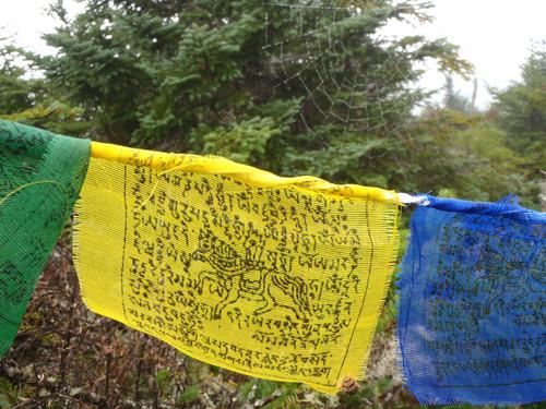 Tibetan prayer flags on the summit of Shrewsbury Peak in Vermont