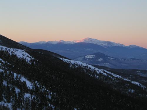 twilight view of Mount Washington in January as seen from South Moat Mountain in New Hampshire