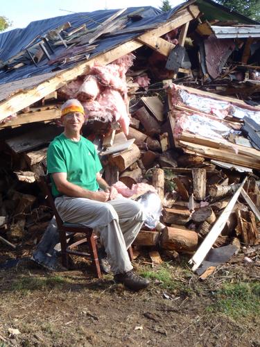 hiker at the demolished cabin on Big Spencer Mountain in Maine