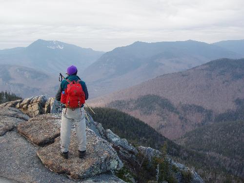 hiker and view from Crawford Mountain in New Hampshire