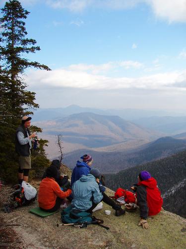 hikers and view from Stairs Mountain in New Hampshire