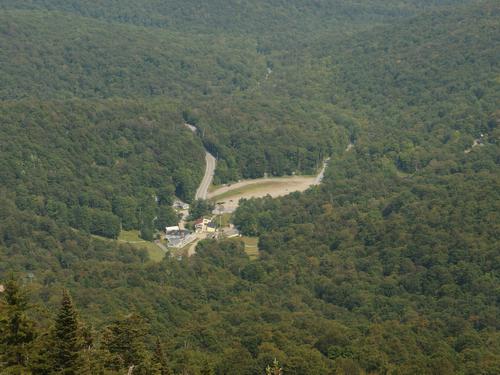 view of Mad River Glen Ski Area base from the panorama viewpoint on Stark Mountain in northern Vermont