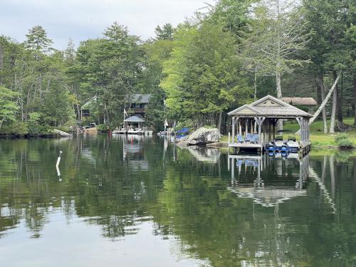 houses on the far side of Sally's Gut in September at Stonedam Island on Lake Winnipesaukee in NH