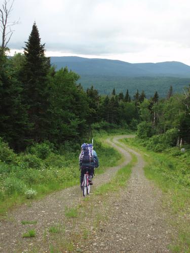 biking down the access road from Stub Hill in New Hampshire