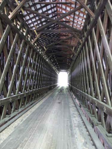 inside of a covered bridge on the Sugar River Rail Trail near Newport New Hampshire