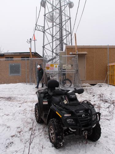 ATV and antenna workers on top of Tenney Mountain in New Hampshire