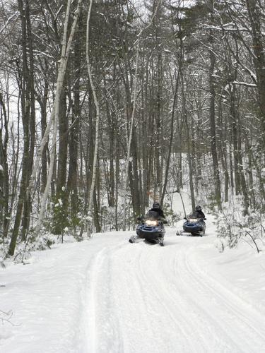 snowmobiles at Tower Hill Pond in New Hampshire
