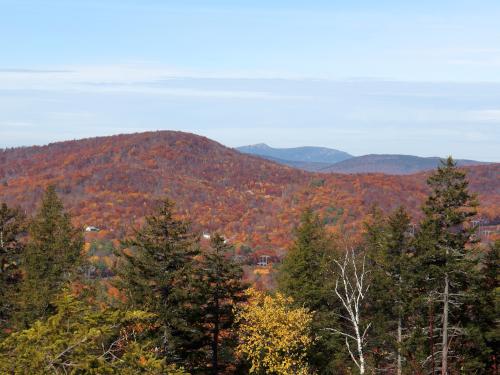 view in October of Cardigan Mountain peaking out over the shoulder of 
Dickinson Hill from Tucker Mountain in New Hampshire