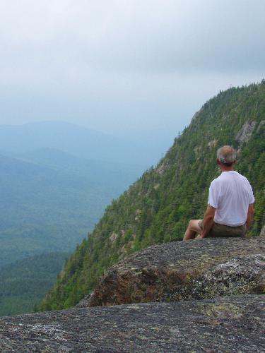 hiker and view from Tumbledown Mountain in Maine