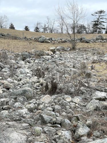 stone pile in March at Turkey Hill and Weir River Farm in eastern Massachusetts