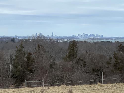 View of Boston skyline in March as seen from Turkey Hill in eastern Massachusetts
