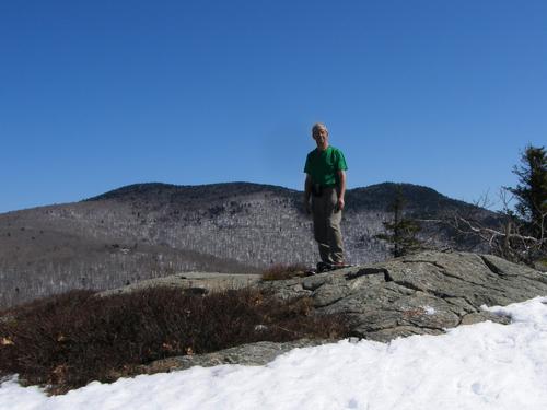 hiker on Turtleback Mountain in New Hampshire