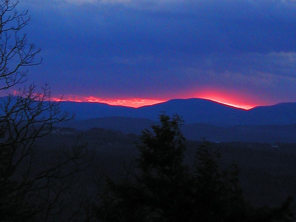 fiery sunset in December as seen from North Uncanoonuc Mountain in New Hampshire