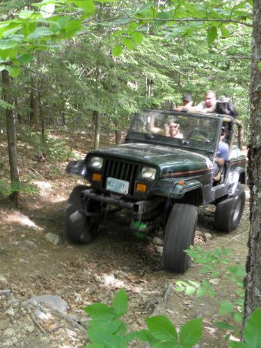 jeep ascending the trail to North Uncanoonuc Mountain in New Hampshire