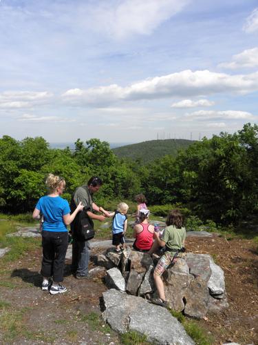 hikers atop North Uncanoonuc Mountain in New Hampshire