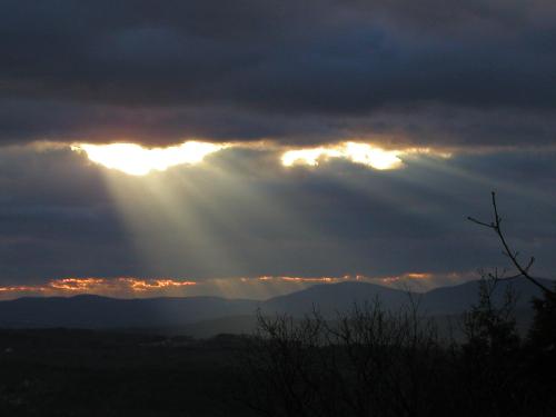 dissipating storm clouds in December as seen from North Uncanoonuc Mountain in New Hampshire