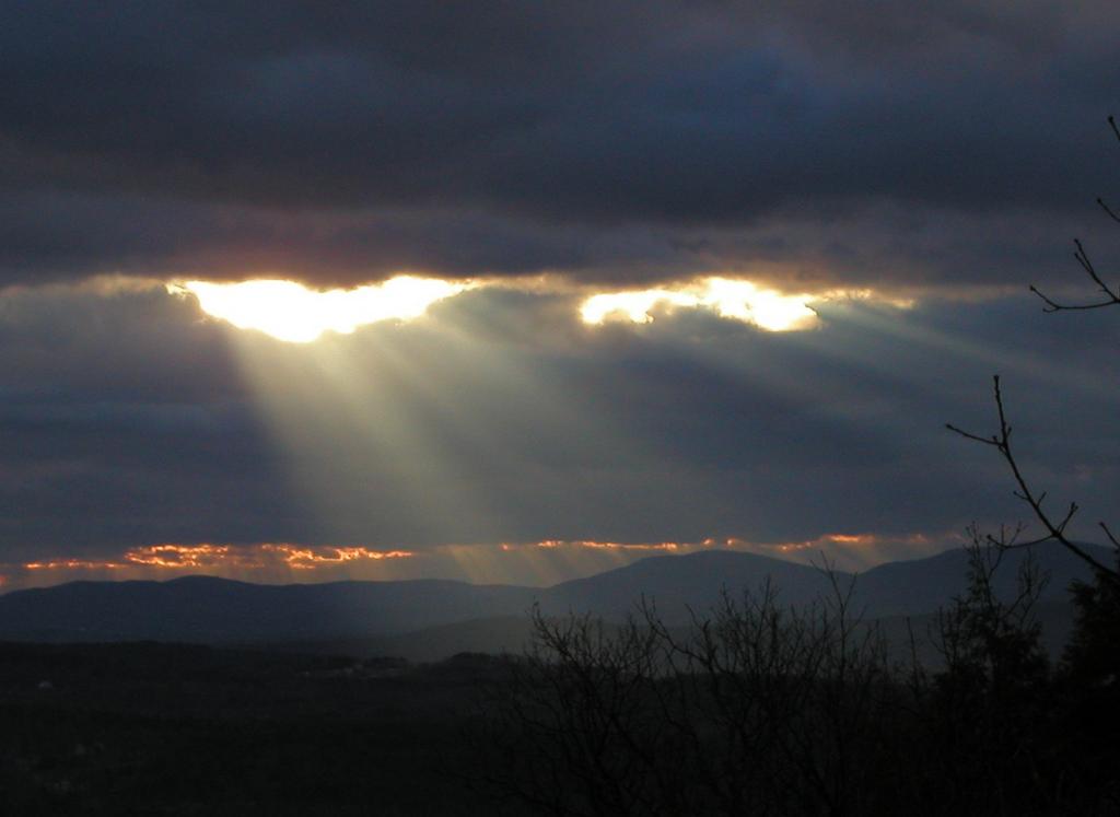 dissipating storm clouds in December as seen from North Uncanoonuc Mountain in New Hampshire