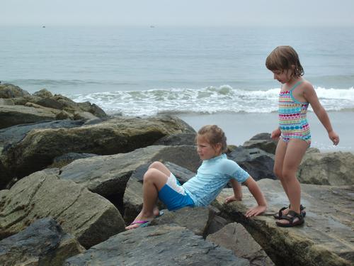 young swimmers on the jetty at Wallis Sands State Beach in New Hampshire