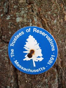 The Trustees of Reservations trail marker on Ward Reservation in Massachusetts