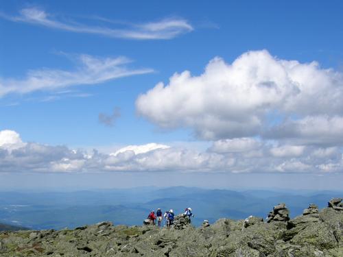 hikers in June on Nelson Crag Trail on the way to Mount Washington in New Hampshire