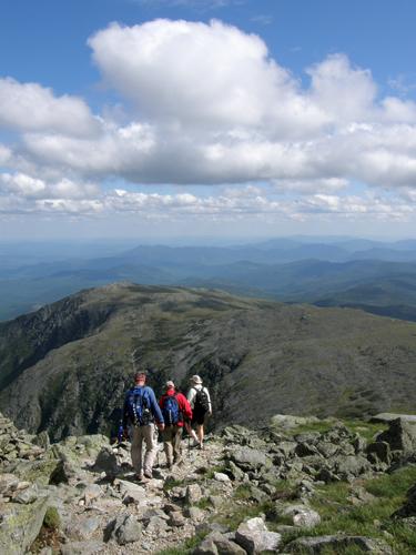 hikers on the trail down from Mount Washington in New Hampshire