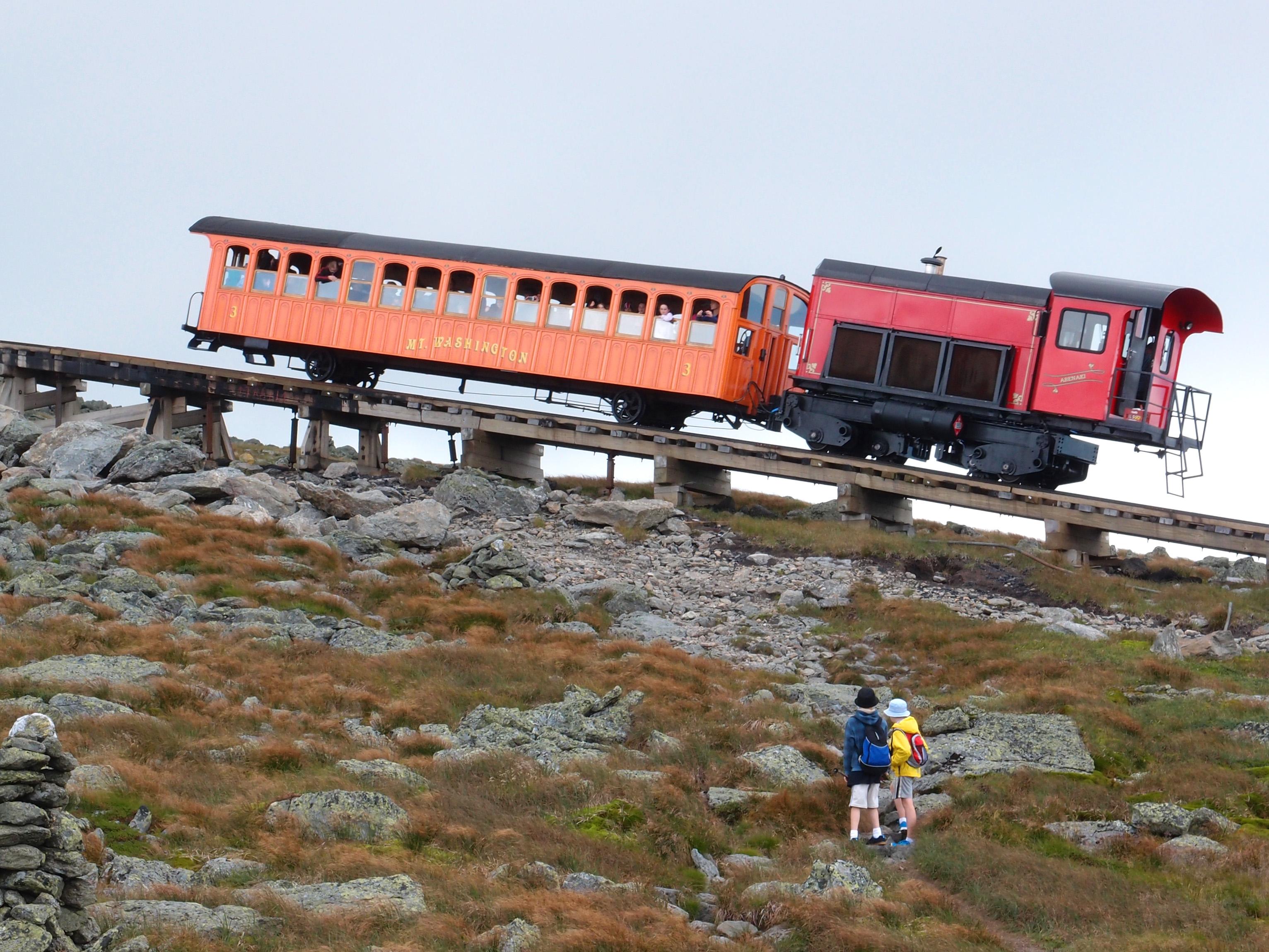 a Cog Railway train heads up Mount Washington in New Hampshire