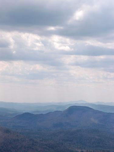 view west from the summit ledge of Mount Weetamoo in New Hampshire