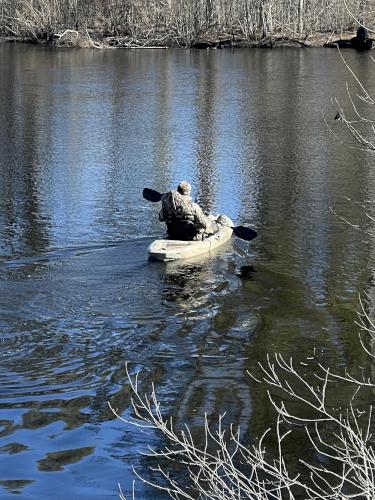 kayaker in February at Grand Wenham Canal Path in northeast MA