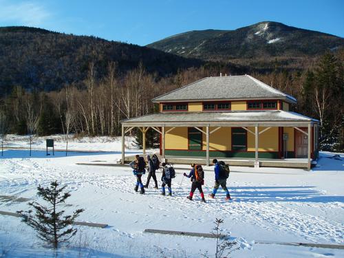 January hikers passing by Crawford Depot on the way to West Field Peak in the White Mountains of New Hampshire