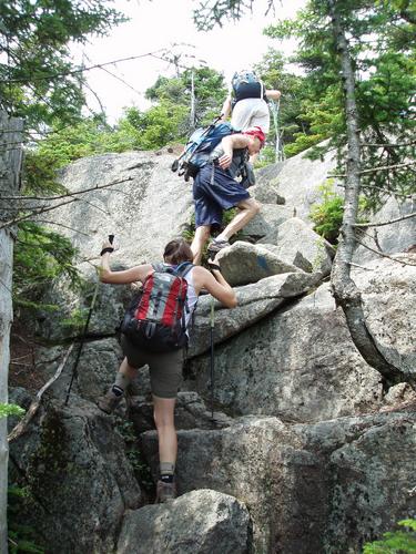 hikers on the Blueberry Ledge Trail to Mount Whiteface in New Hampshire
