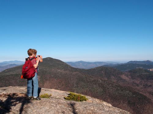 hikers at a lookout on Mount Whiteface in the Sandwich Range in New Hampshire