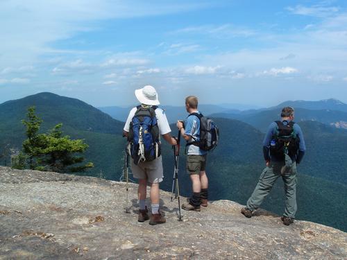 hikers and view from the Blueberry Ledge Trail in New Hampshire