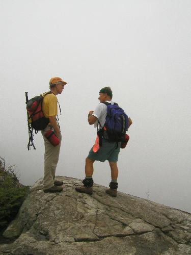 hikers in the fog on Wildcat Mountain in New Hampshire