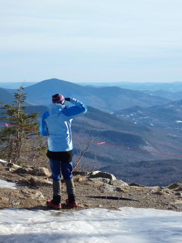 hiker near the summit of Wildcat Mountain in New Hampshire