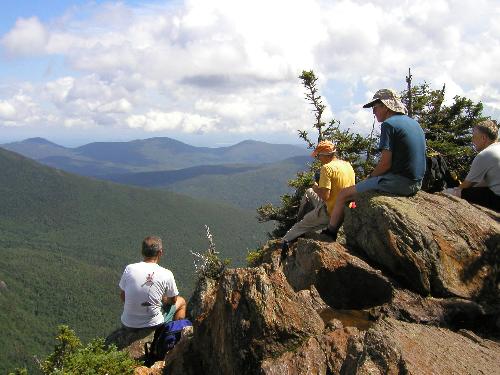 hikers and view from Wildcat Mountain in New Hampshire