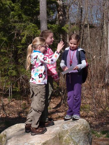 kids check out the trailmap before a hike into Wildcat Falls in southern New Hampshire